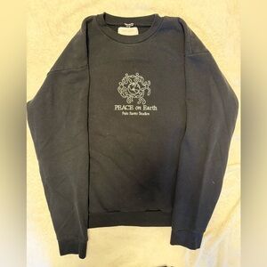 Palo Santo peace on earth crewneck